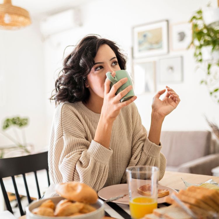 Woman enjoying coffee at home